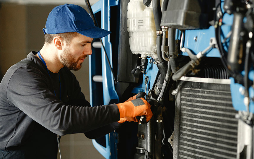 Mechanic Working on Truck 1 Mechanic Working on Truck 1